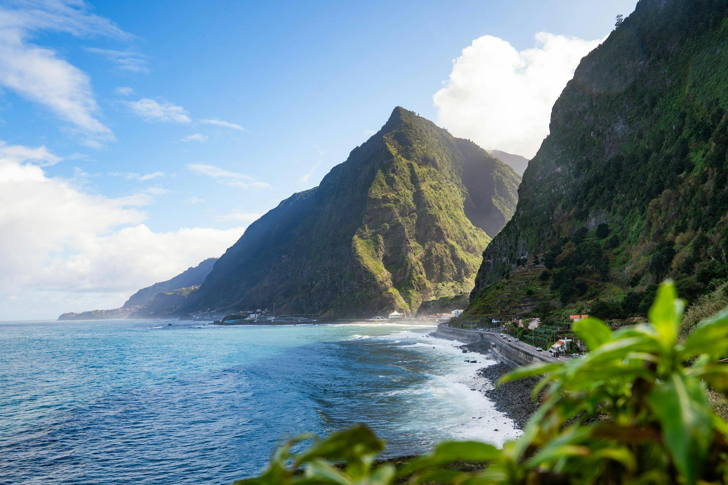 Green cliffs dropping into the Atlantic on the north coast of Madeira