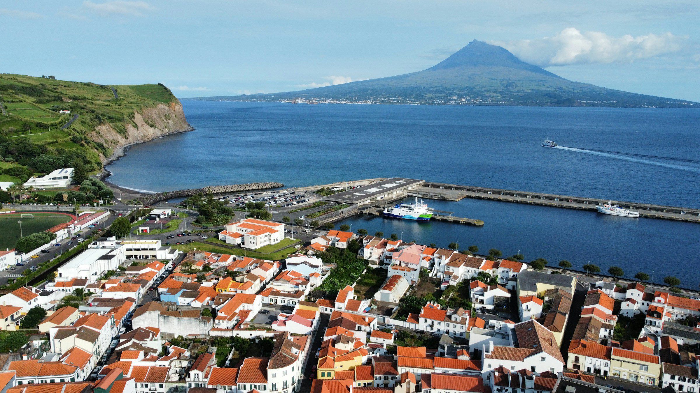 The town and harbour of Horta on Faial with Mount Pico across the channel